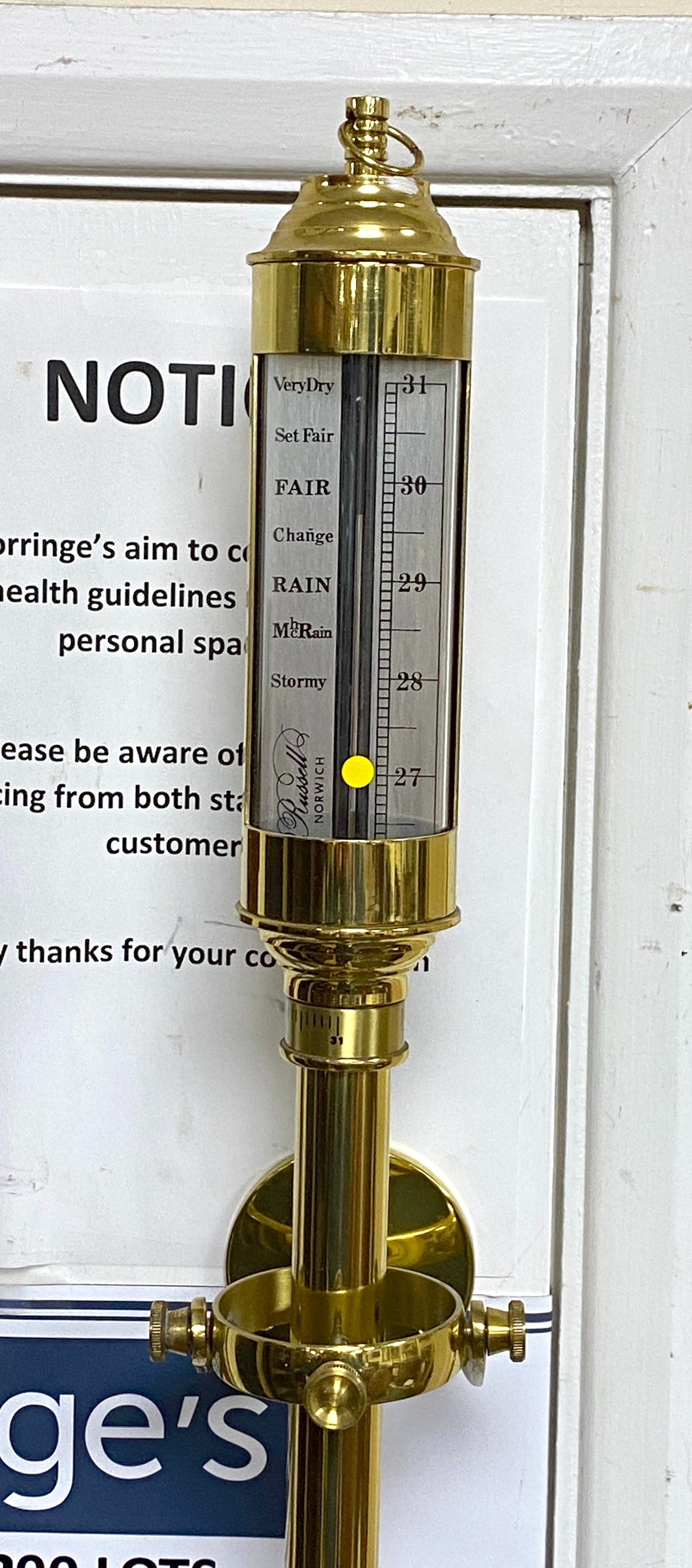 A reproduction brass ship's barometer and thermometer with gimbal mount, height 92cm